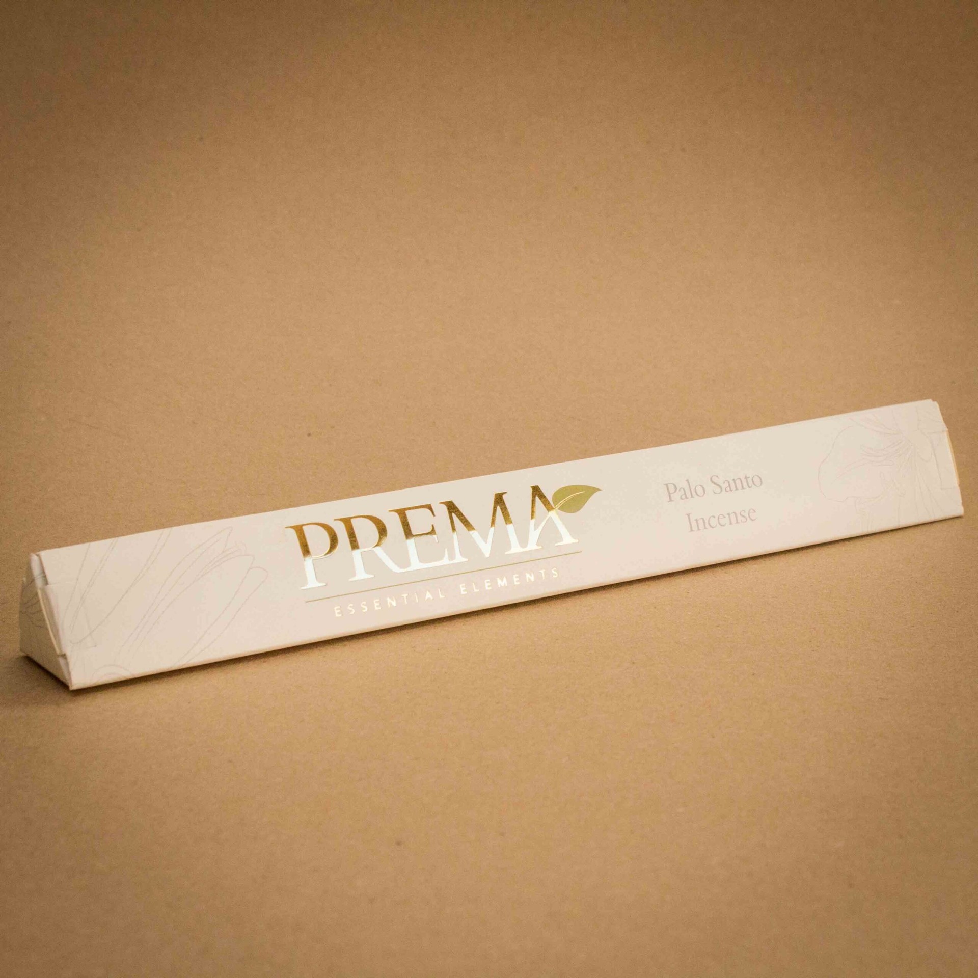 Prema Essential Elements Palo Santo incense triangular carton with gold foil logo