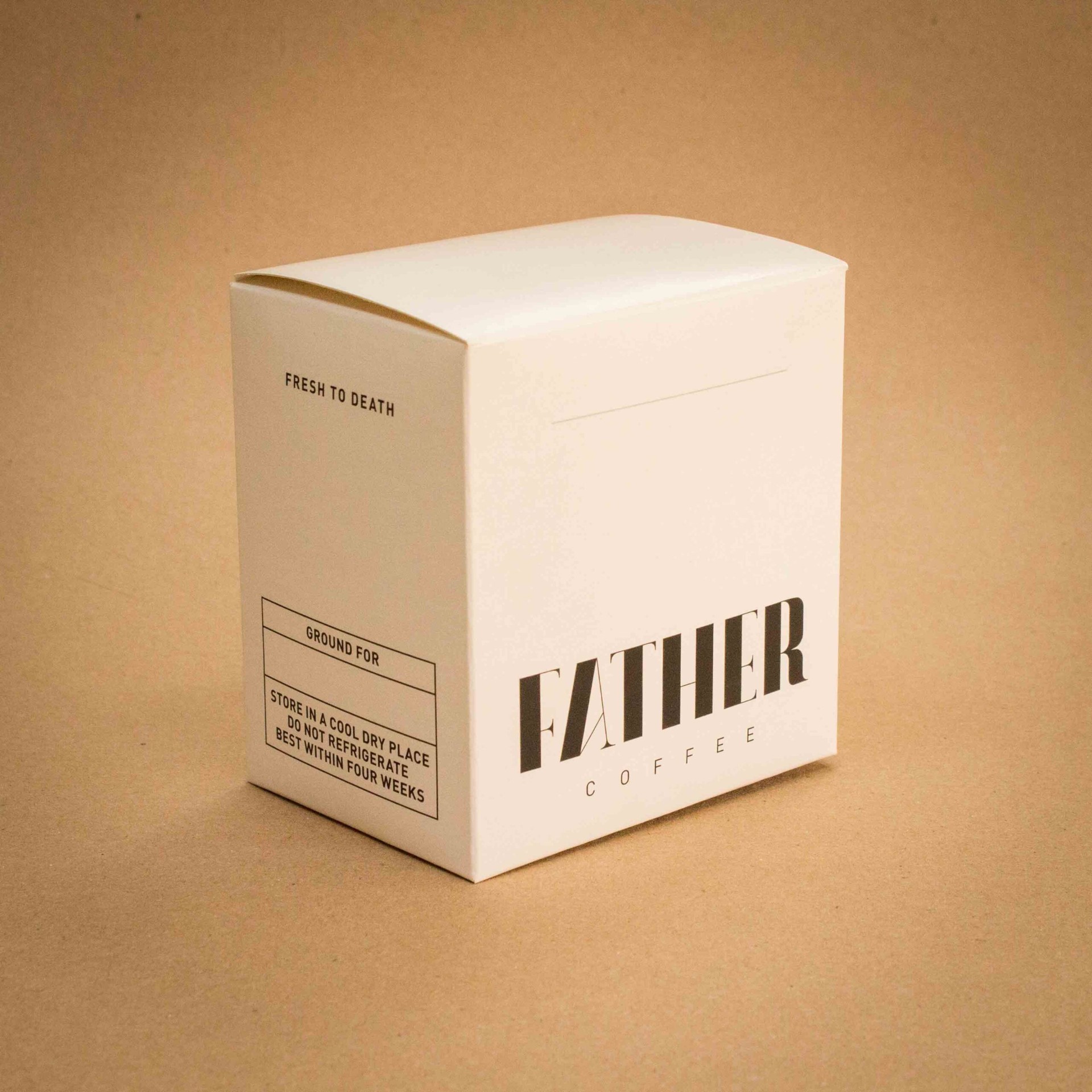 Father Coffee minimalist white folding carton with black display typography