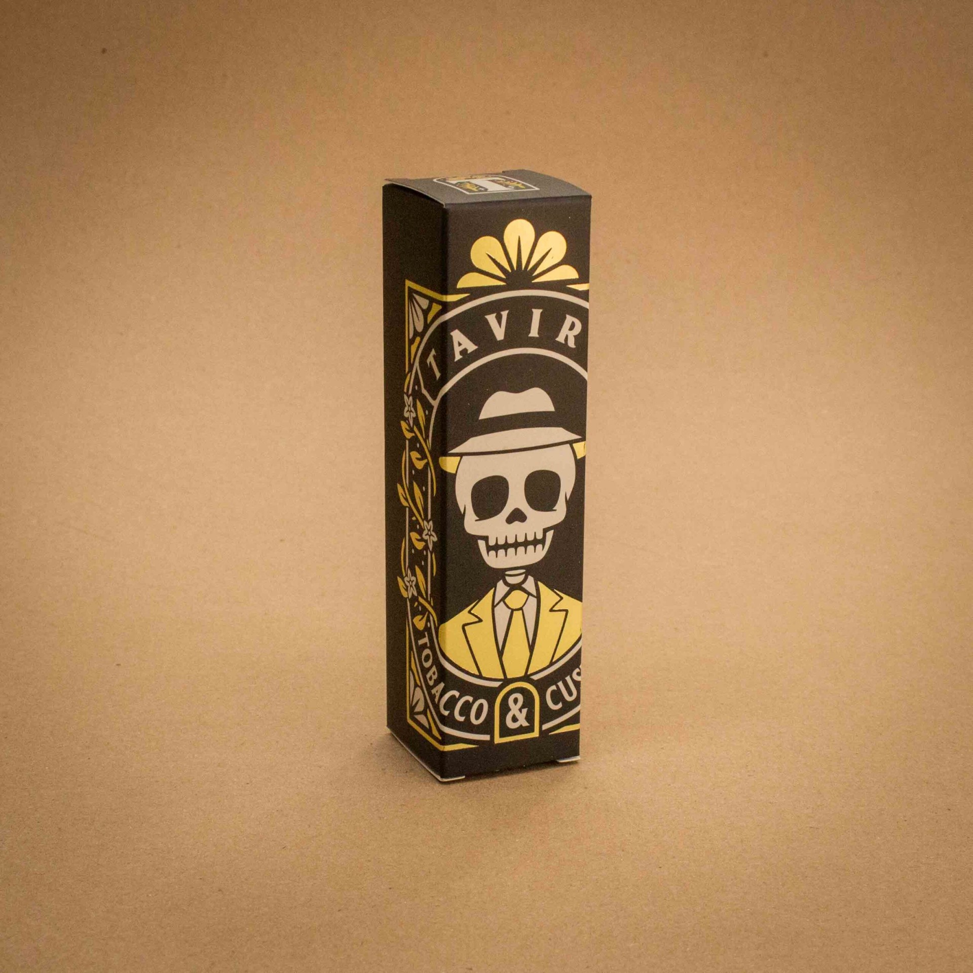 Taviro Tobacco & Custard vape carton with skull illustration and gold foil detailing